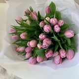 Beautiful lilac tulips wrapped in signature Florada paper and ribbon. 